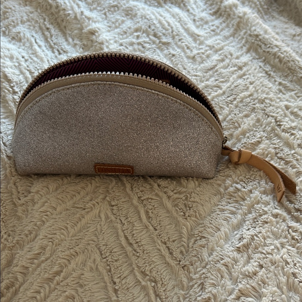 Consuela Glitter Pouch with Purple Lining